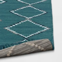 7' X 10' Soft Moroccan Woven Tapestry With Double Knot Fringe Outdoor Rug Teal - Opalhouse™ -Home Furnishings Store GUEST 3a15645d 40e3 4c67 92df d55f6ad30a10 1